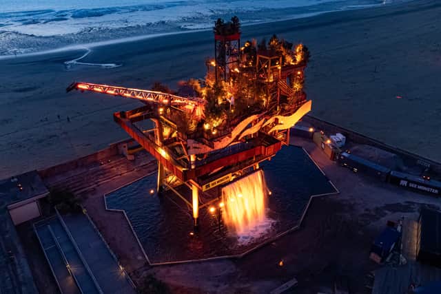 See Monster Oil Rig Art Installation lighting at night