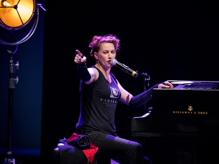 Pianist at Bath Festival 70th Anniversary Event with lighting and microphone